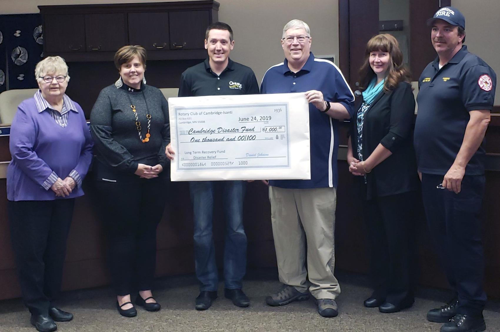 City Council accepting a donation check